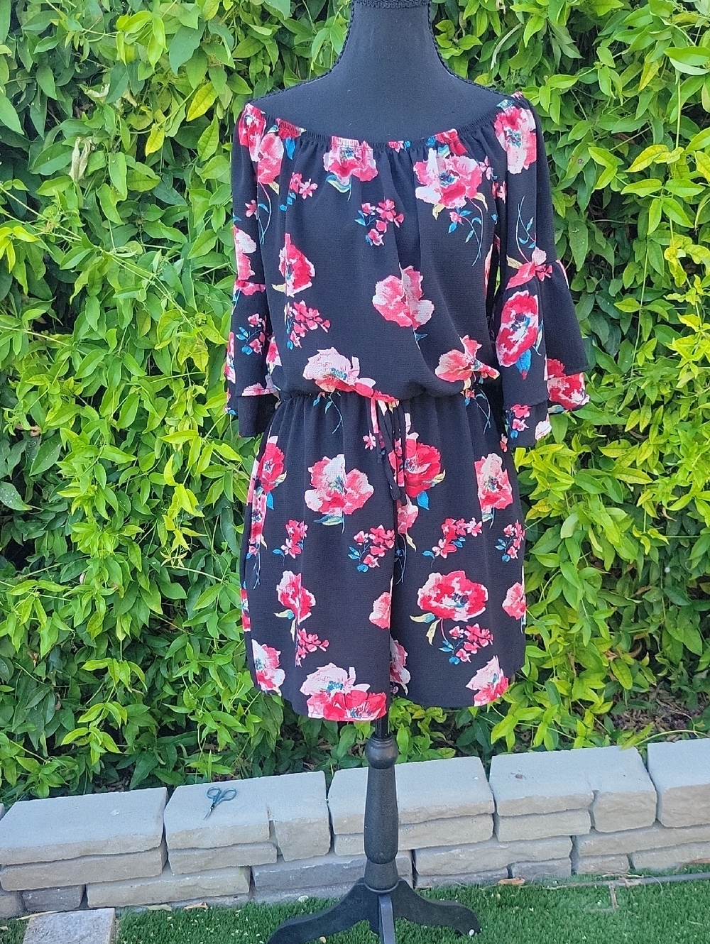 Off-Shoulder Black Floral Flowy Shorts Romper With Pockets